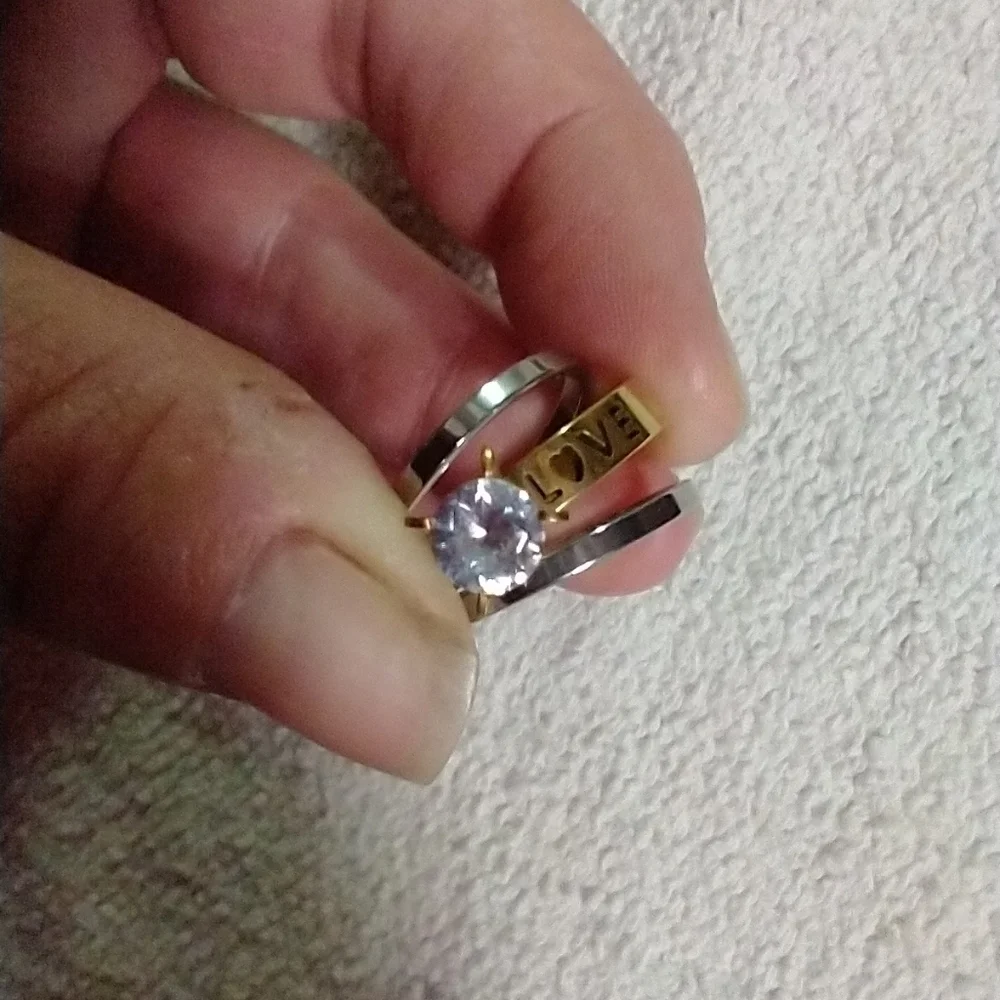 Two tone silvertone goldtone love ❣️ crystal ring 3 rings in total stainless st.